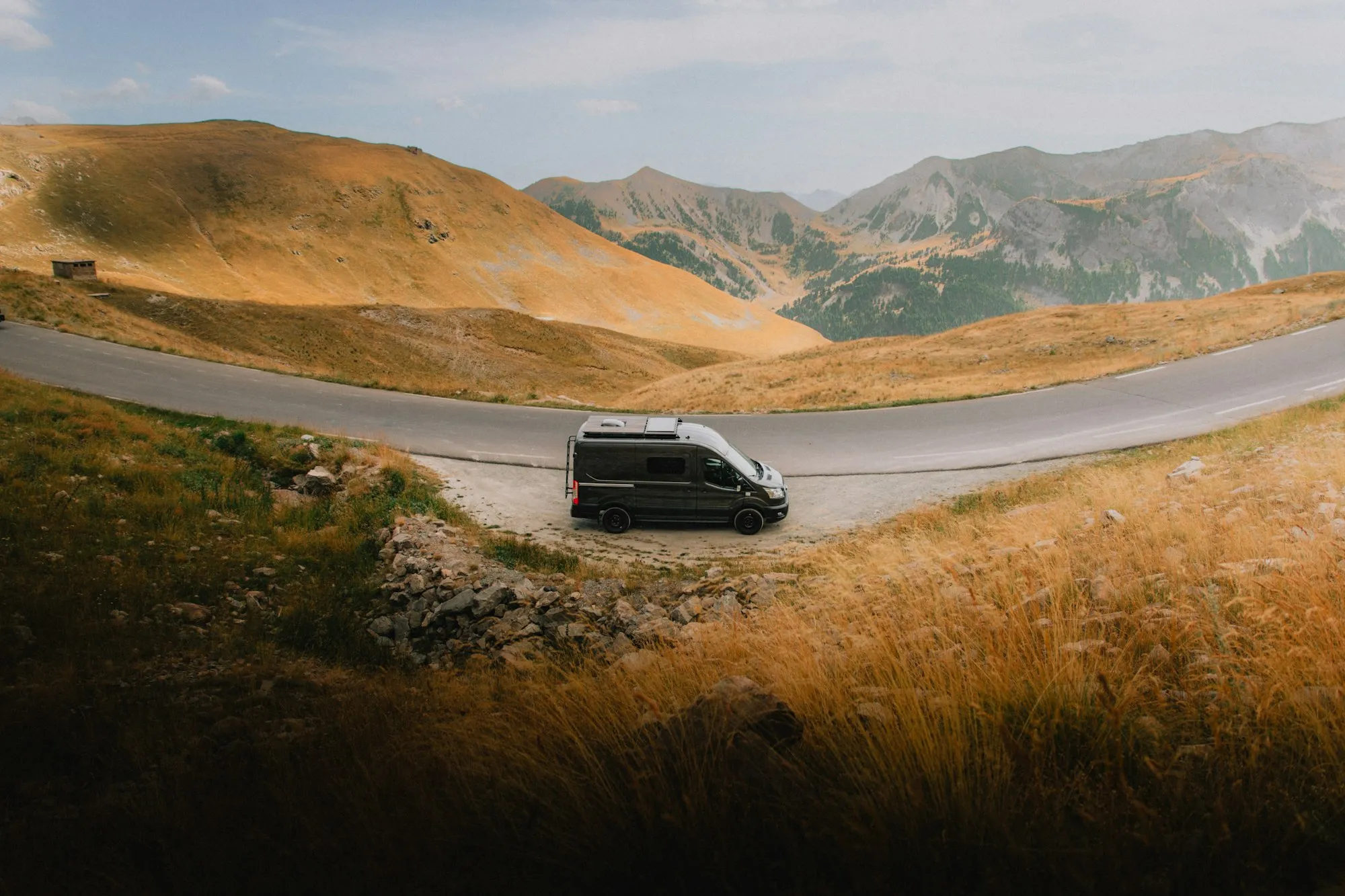 Campervan driving a winding mountain road