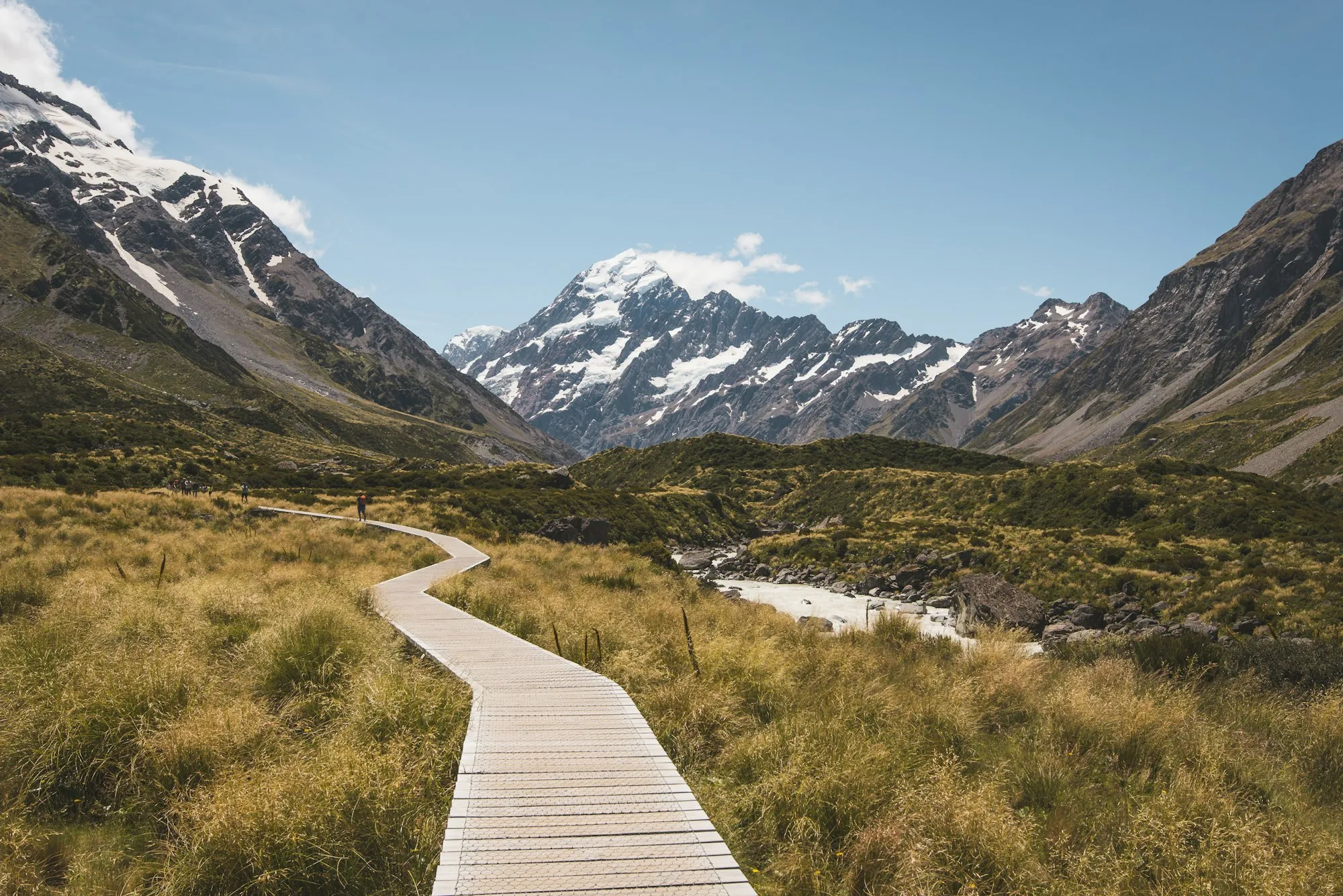 A walking trail through the mountains in New Zealand's Hooker Valley